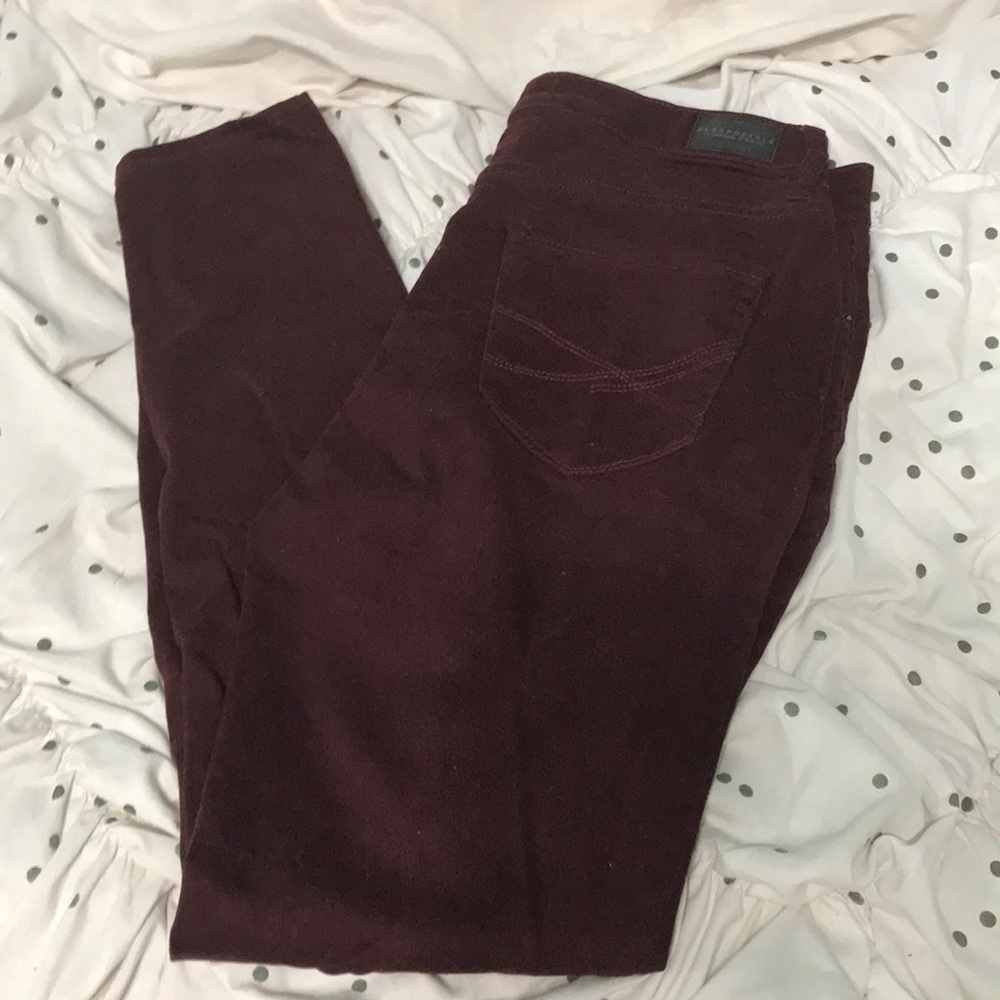 Maroon high waisted jeggings.